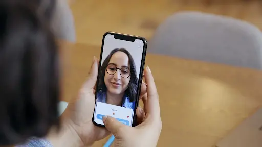 A person having a video call with a girl.